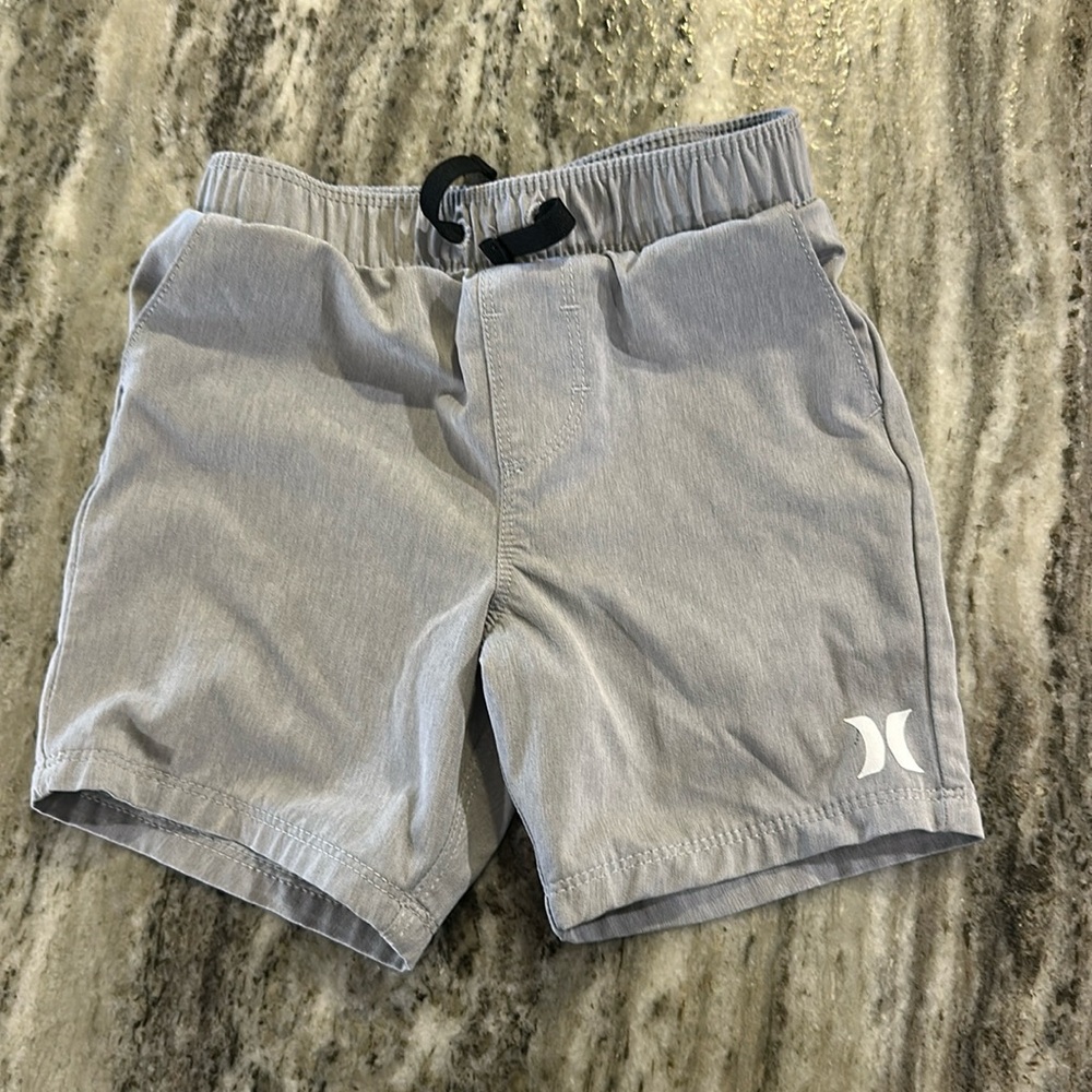 Boys pull on shorts